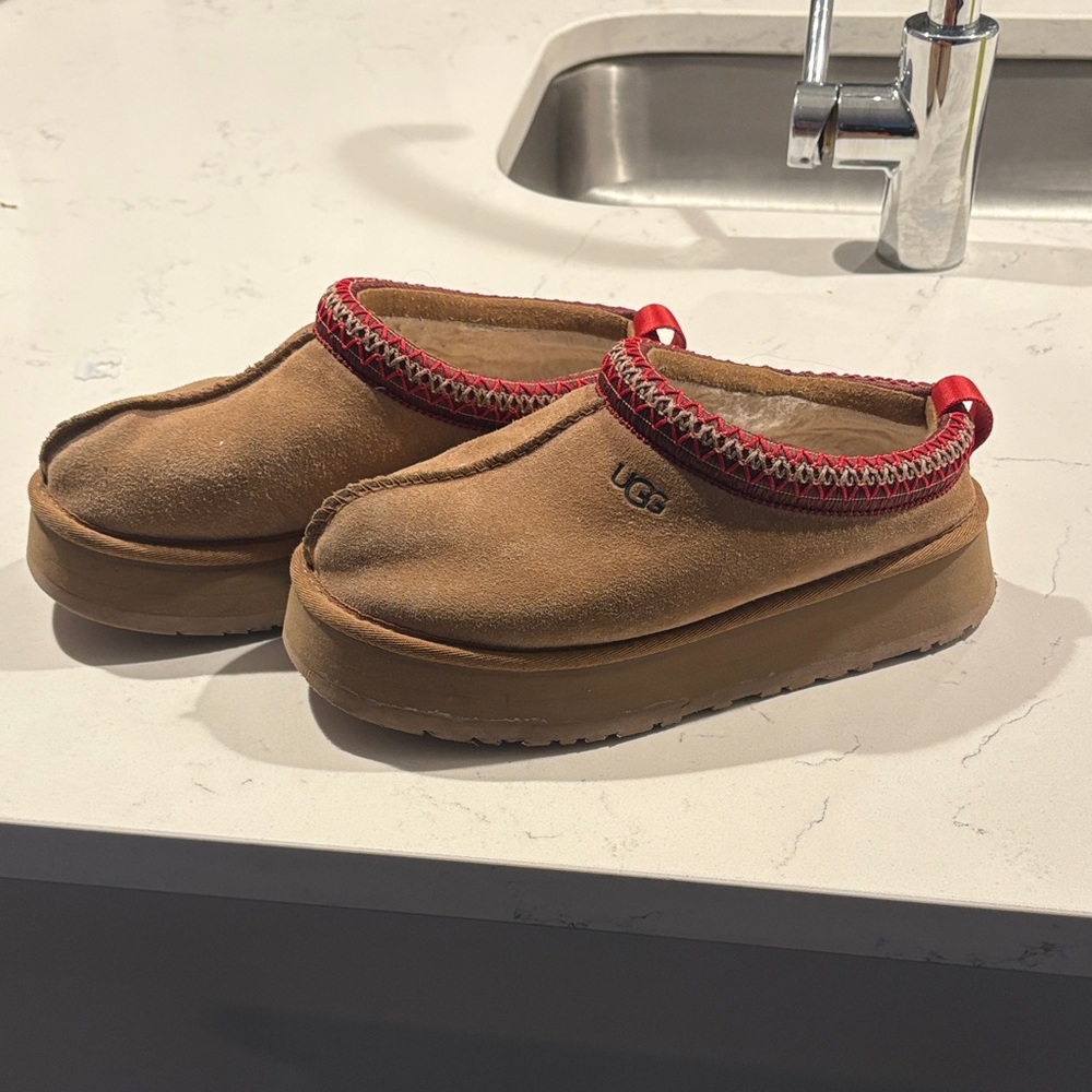 UGG Kids Tan Slippers with Red Trim